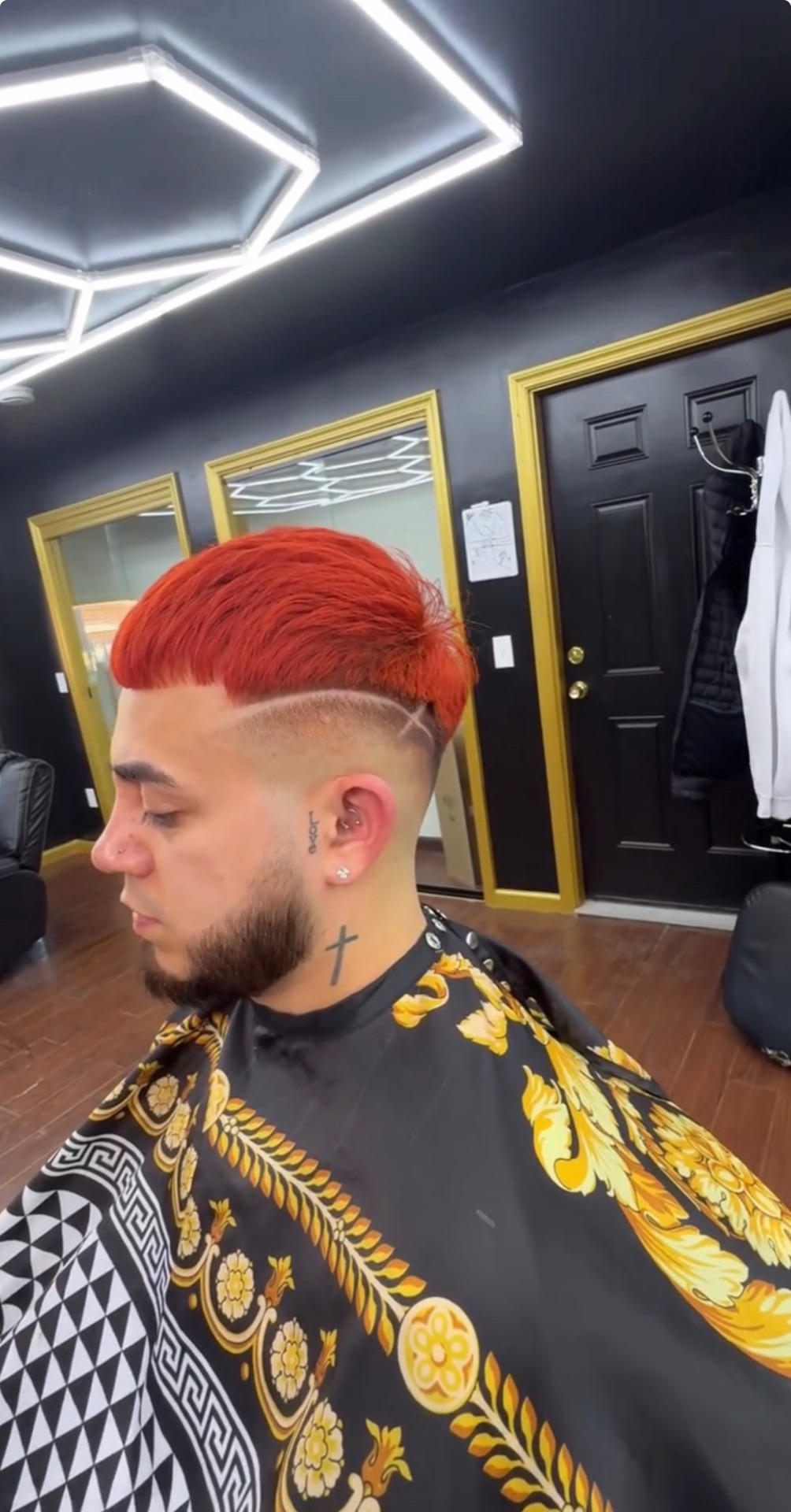 Red dyed top with fade and beard